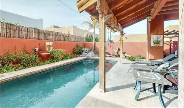 a view of swimming pool from a balcony