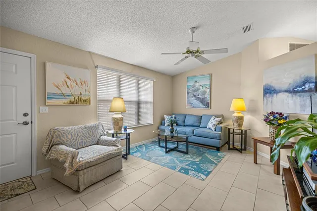 a living room with furniture and window