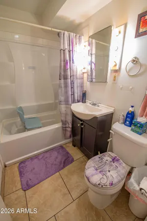 a bathroom with a sink a bath tub and a shower