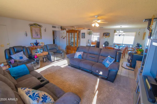 a living room with furniture and a couch
