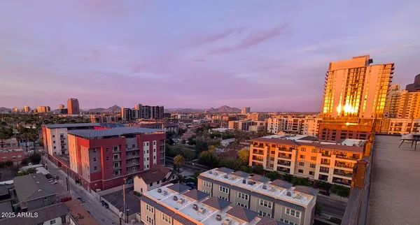 a view of a city with lots of trees