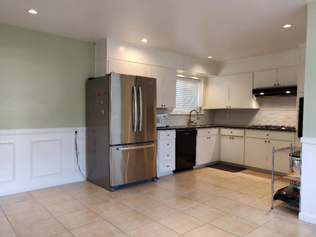 1482 Fields Drive San Jose, CA 95129 - Photo 3 of 15 a kitchen with a refrigerator and a stove top oven
