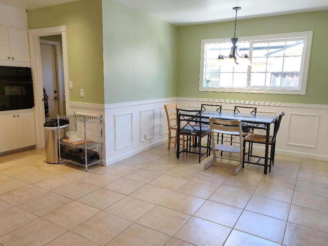 1482 Fields Drive San Jose, CA 95129 - Photo 4 of 15 a view of a dining room with furniture and window