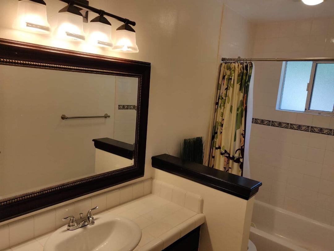 1482 Fields Drive San Jose, CA 95129 - Photo 6 of 15 a bathroom with a sink and a mirror