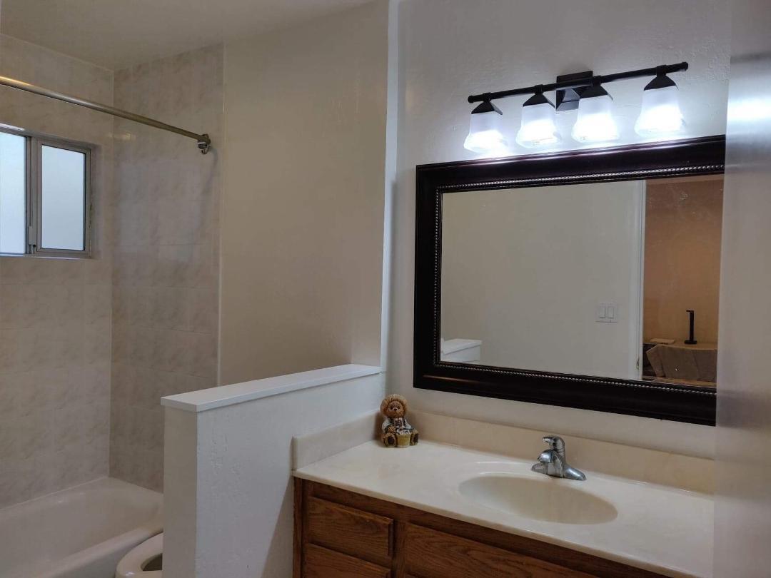 1482 Fields Drive San Jose, CA 95129 - Photo 10 of 15 a bathroom with a sink and a mirror