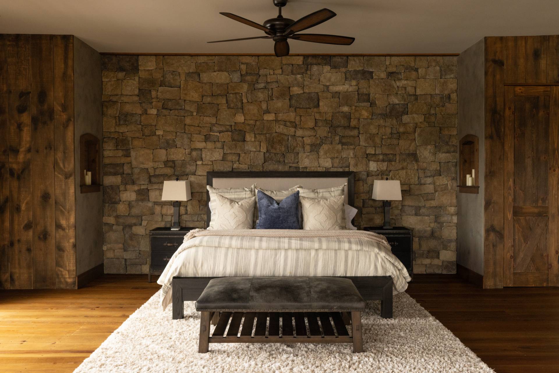 254 Mitchell Lane Bridgehampton, NY 11932 - Photo 13 of 36 a bedroom with a bed and wooden floor