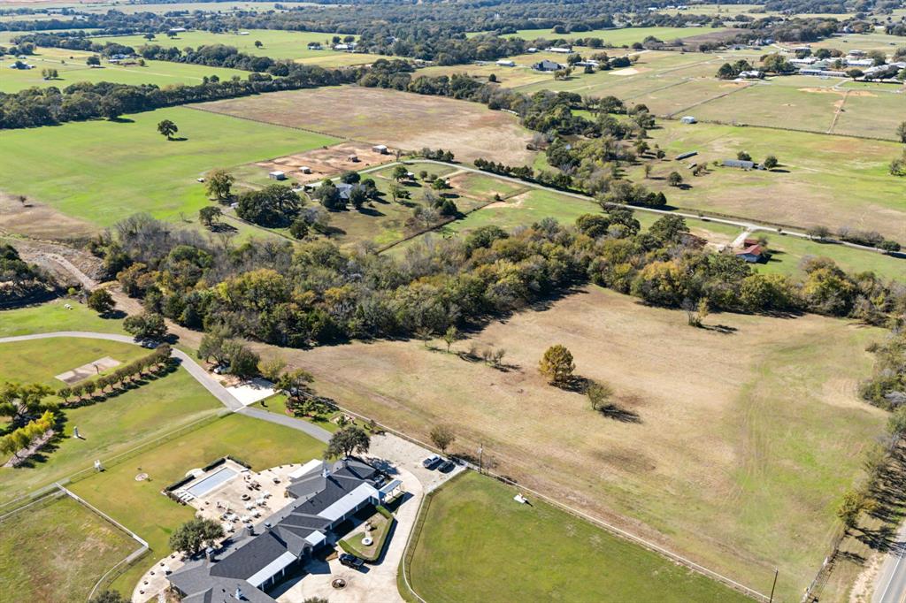 2212 Spring Hill Road Aubrey, TX 76227 - Photo 20 of 36 an aerial view of a residential houses with outdoor space