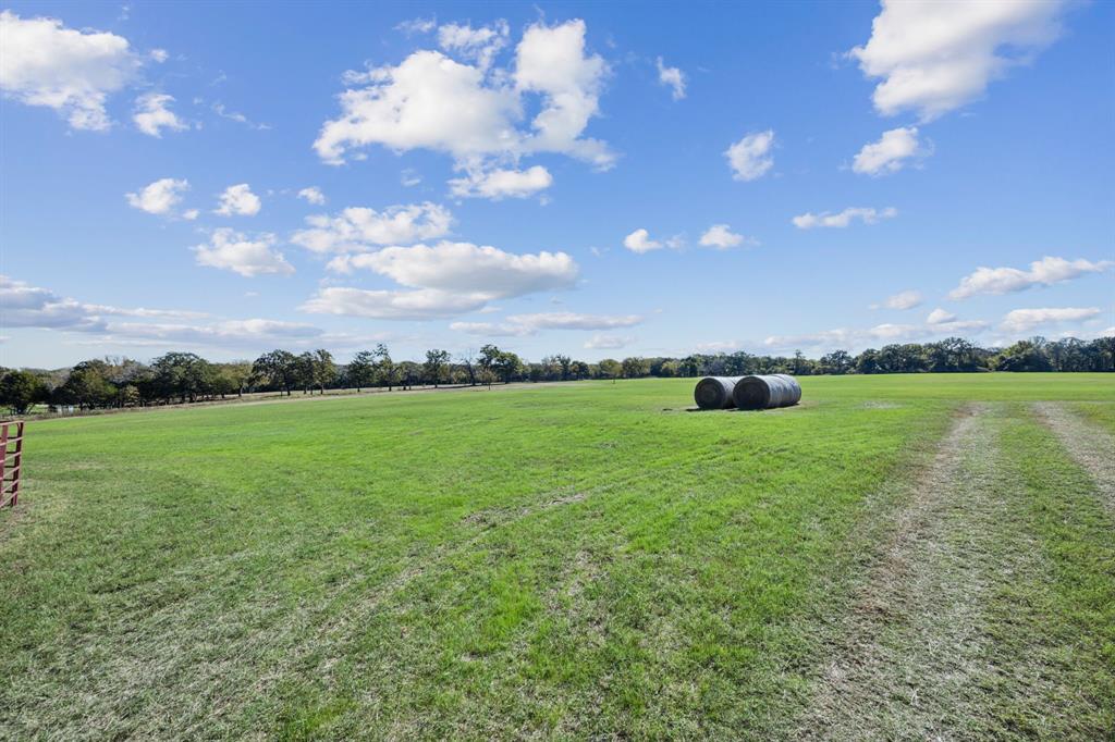 2212 Spring Hill Road Aubrey, TX 76227 - Photo 27 of 36 a view of yard with outdoor seating