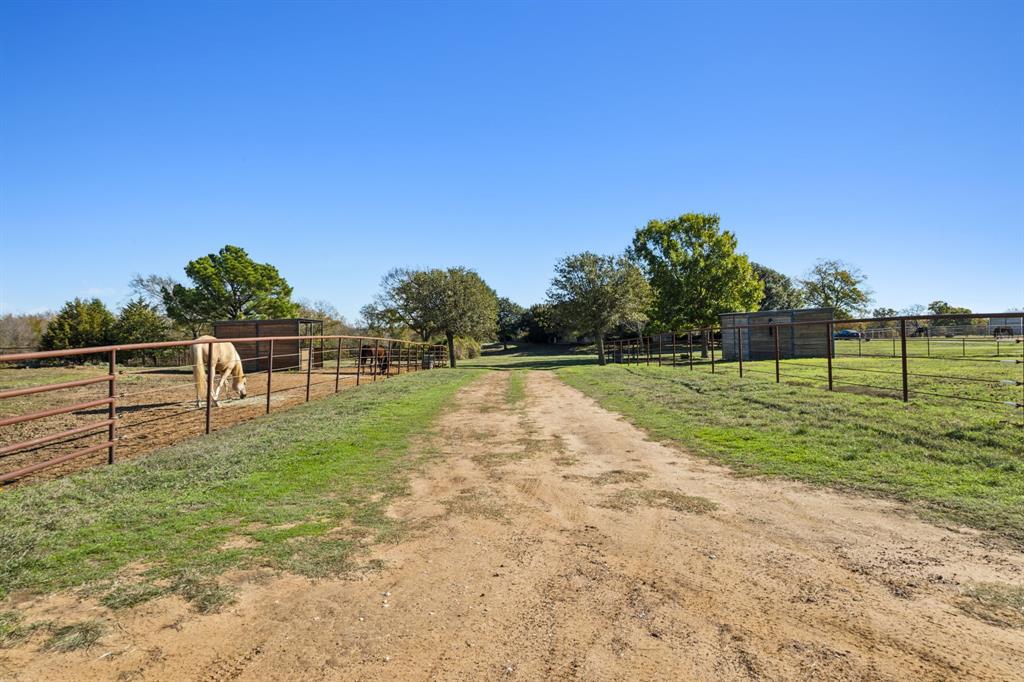 2212 Spring Hill Road Aubrey, TX 76227 - Photo 30 of 36 a view of a park with large trees