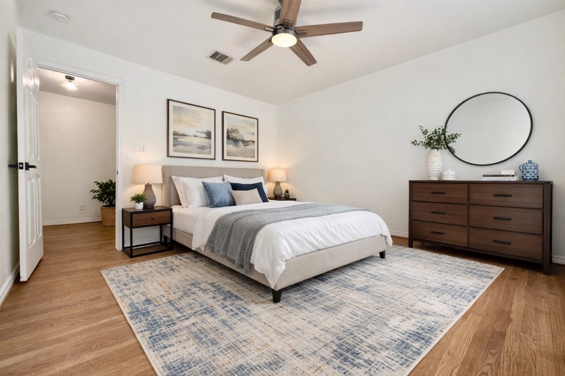 2126 Banks Street, Unit 3 Houston, TX 77098 - Photo 19 of 41 a bedroom with a bed and a dresser