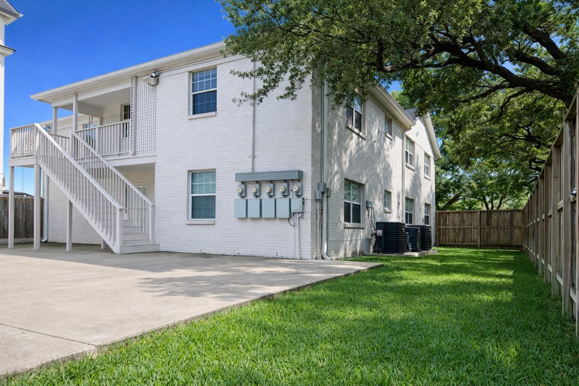 2126 Banks Street, Unit 3 Houston, TX 77098 - Photo 35 of 41 a view of a house with a yard