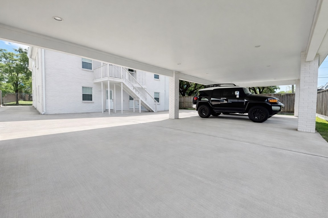 2126 Banks Street, Unit 3 Houston, TX 77098 - Photo 39 of 41 a car parked in front of house