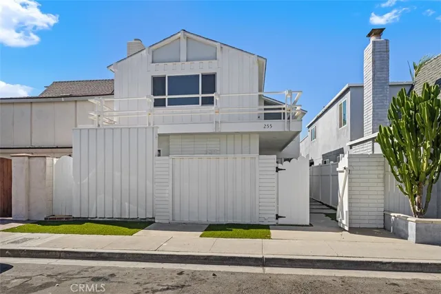 a view of a building with a yard