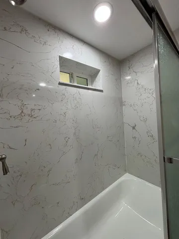 a bathroom with a bathtub