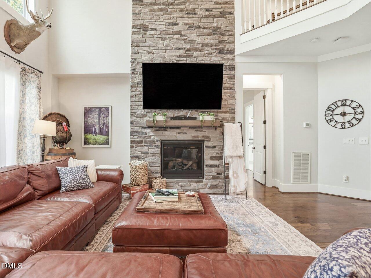36 Nuthatch Pittsboro, NC 27312 - Photo 20 of 66 a living room with furniture and a fireplace