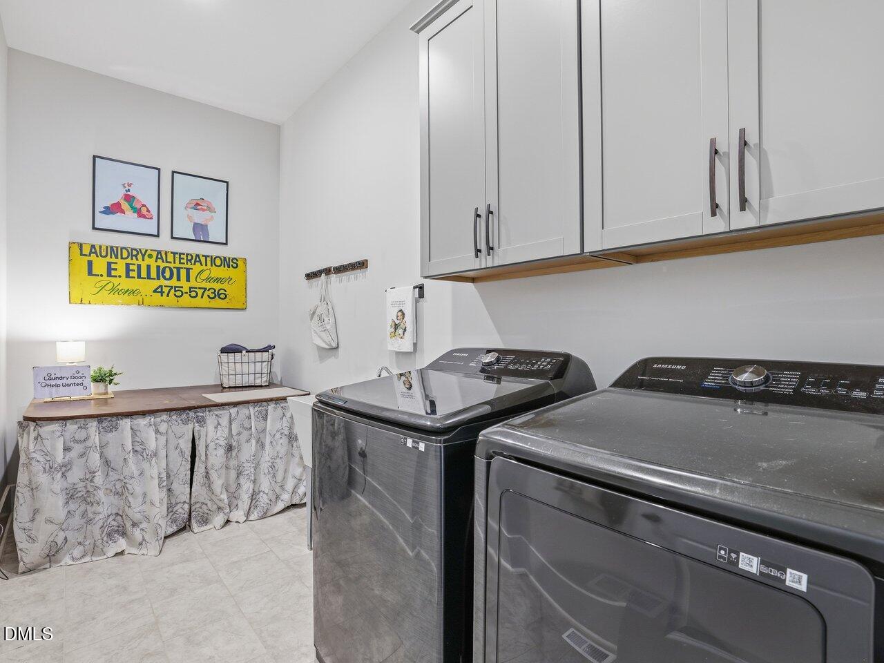36 Nuthatch Pittsboro, NC 27312 - Photo 24 of 66 a utility room with stainless steel appliances granite countertop a washer and dryer