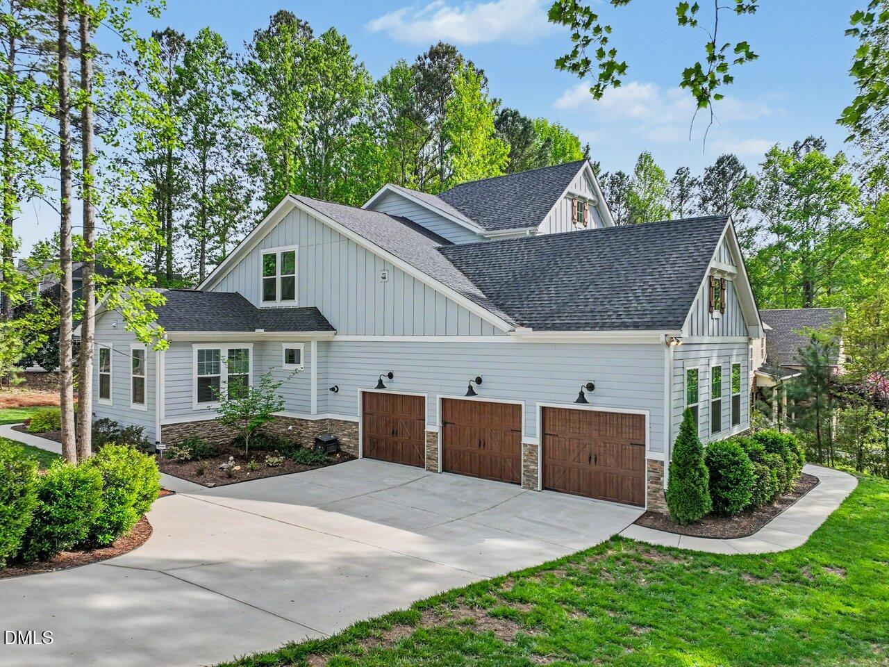 36 Nuthatch Pittsboro, NC 27312 - Photo 2 of 66 a front view of house with yard and green space