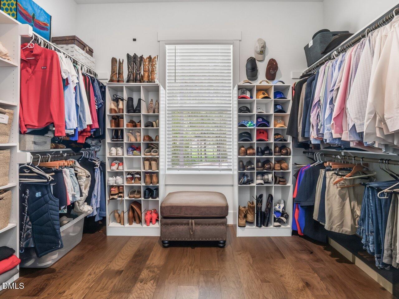 36 Nuthatch Pittsboro, NC 27312 - Photo 31 of 66 a view of walk in closet with clothes and shoes