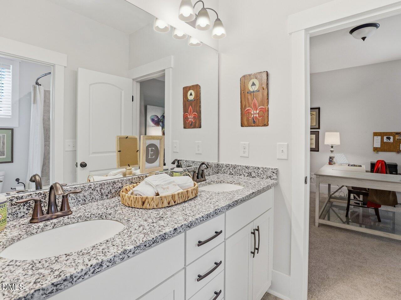 36 Nuthatch Pittsboro, NC 27312 - Photo 47 of 66 a bathroom with a granite countertop double vanity sink and a mirror