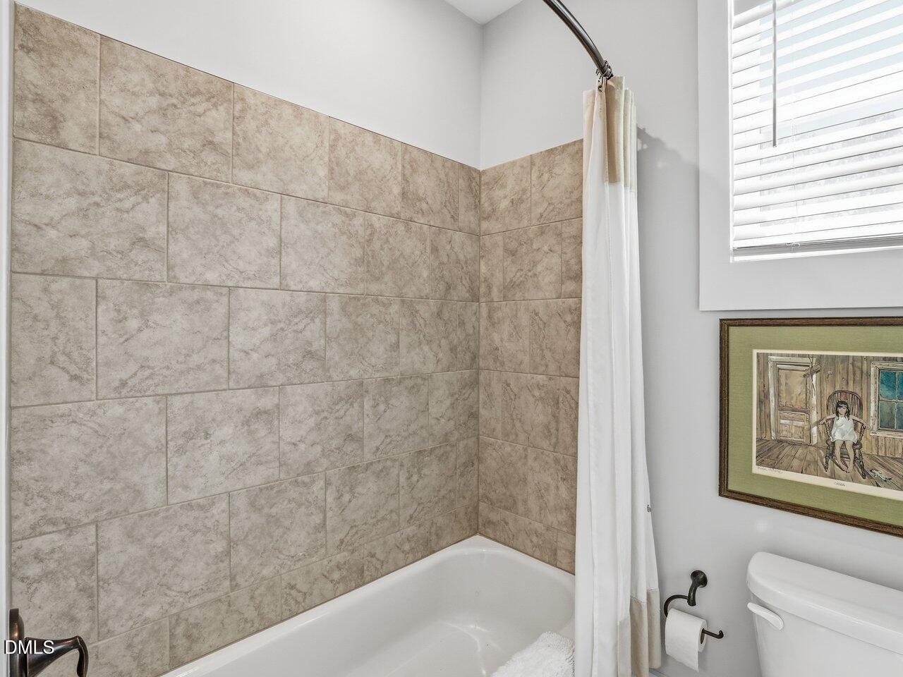 36 Nuthatch Pittsboro, NC 27312 - Photo 48 of 66 a bathroom with a bathtub and shower