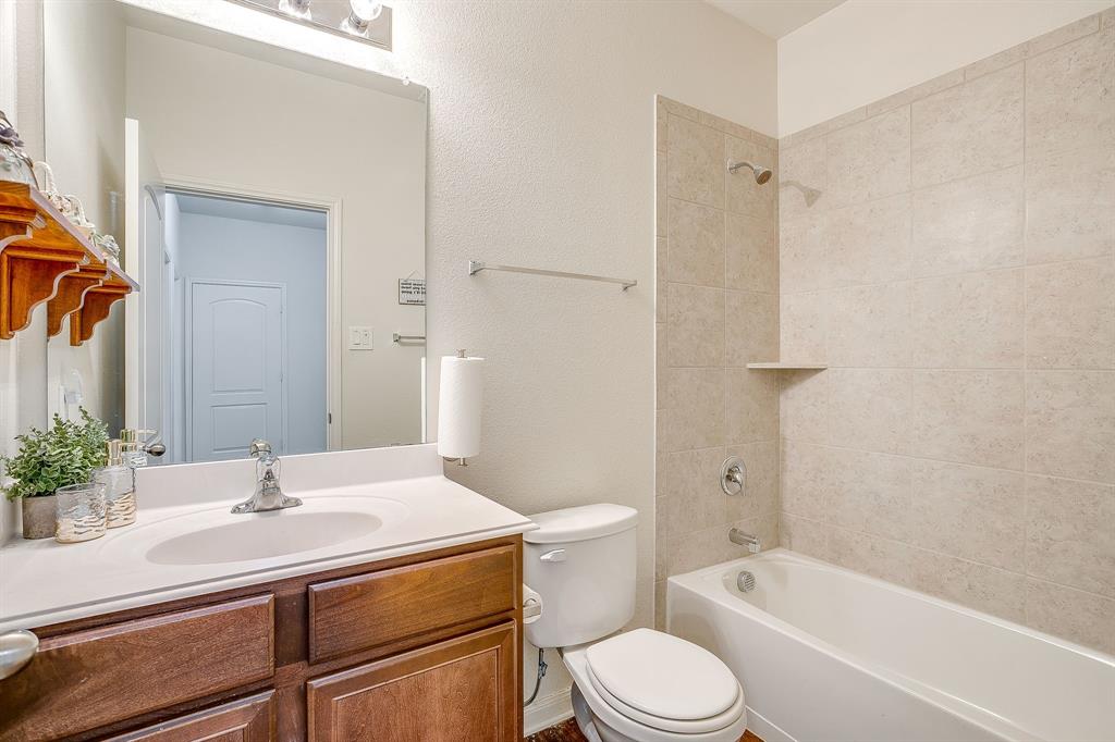 136 Kennedy Drive Venus, TX 76084 - Photo 18 of 27 a bathroom with a sink toilet tub and shower
