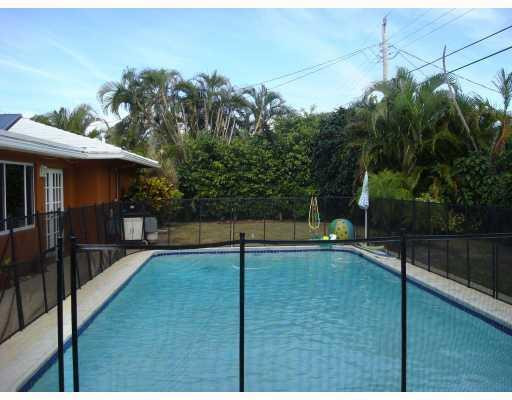 974 Southwest 12th Avenue Boca Raton, FL 33486 - Photo 1 of 10 Swimming Pool/Hot Tub/Sauna