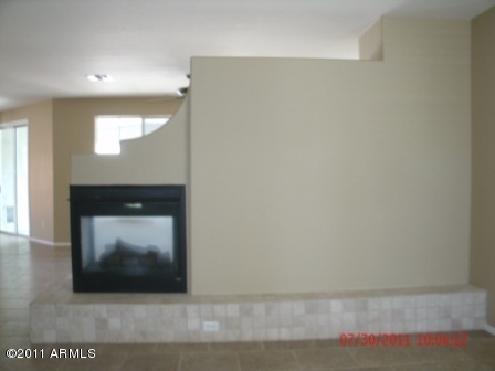 2756 East Virginia Street Gilbert, AZ 85296 - Photo 5 of 10 Two side fireplace