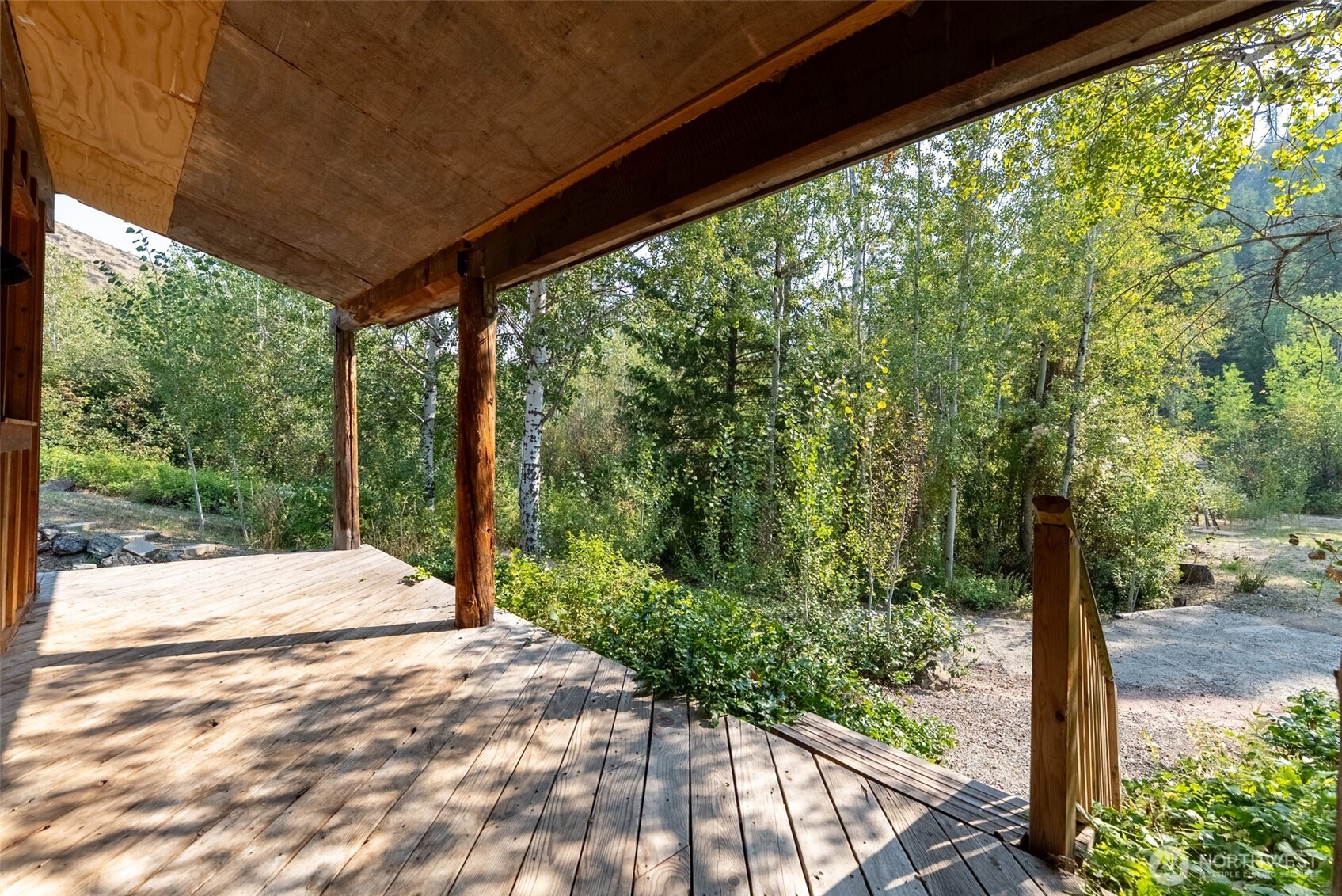 96 Alder Creek Road Twisp, WA 98856 - Photo 32 of 40 a house view with a garden space