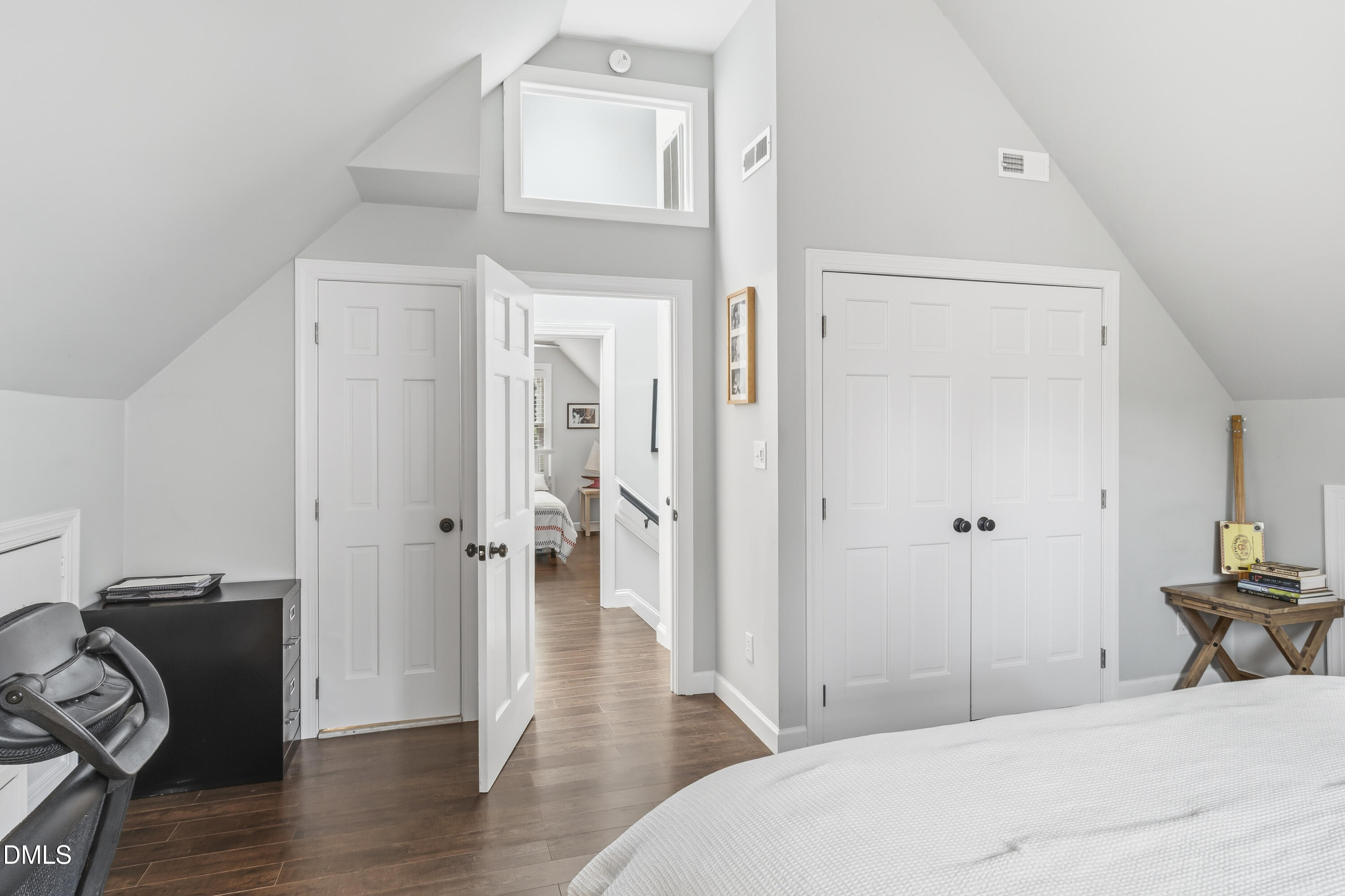 3004 West Annaley Drive Raleigh, NC 27604 - Photo 37 of 44 a bedroom with a bed and wooden floor
