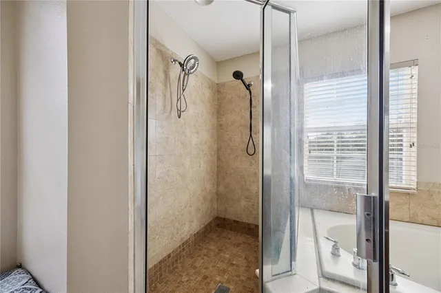 a view of a yard with a house and a tree