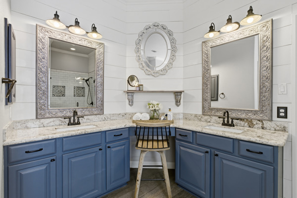 464 Monahans Drive Georgetown, TX 78628 - Photo 21 of 39 a spacious bathroom with a granite countertop double vanity sink and a mirror