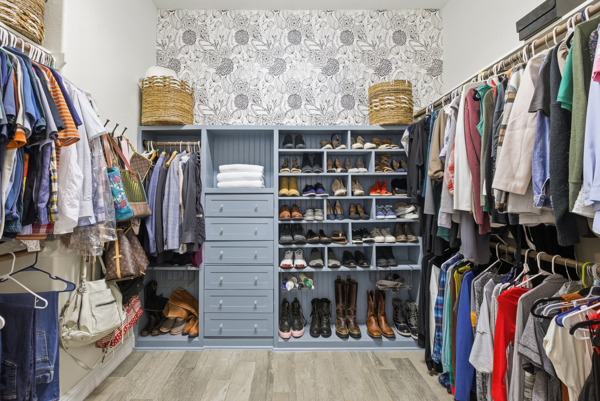 464 Monahans Drive Georgetown, TX 78628 - Photo 23 of 39 a view of walk in closet with clothes and shoes