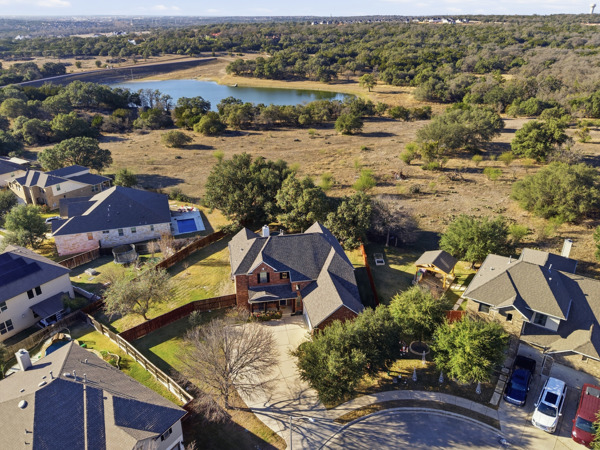464 Monahans Drive Georgetown, TX 78628 - Photo 3 of 39 an aerial view of residential houses with outdoor space and river