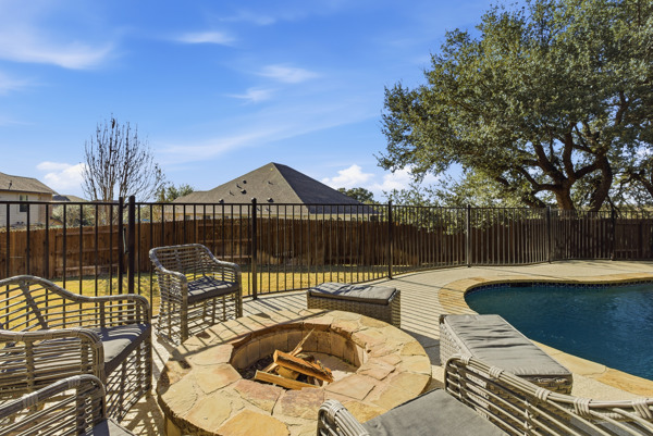 464 Monahans Drive Georgetown, TX 78628 - Photo 35 of 39 a view of a swimming pool with a patio