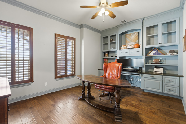 464 Monahans Drive Georgetown, TX 78628 - Photo 8 of 39 a work room with furniture and wooden floor