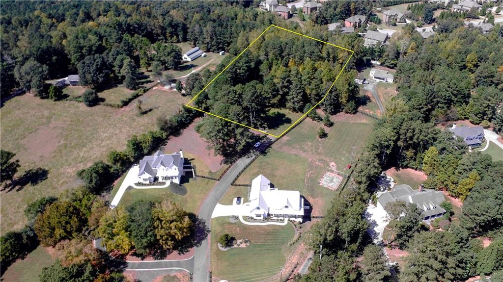 16070 Freemanville Road Milton, GA 30004 - Photo 1 of 1 Lot lines are approximate but not drawn to scale.