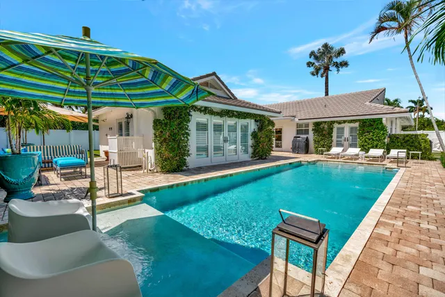 a chairs and table in the backyard