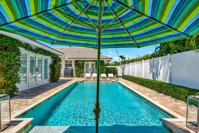 a view of a backyard with a small cabin
