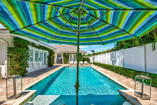 a view of a dinning table and chair in the patio
