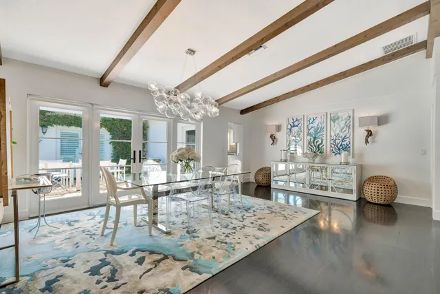 a kitchen with granite countertop cabinets stainless steel appliances and a sink