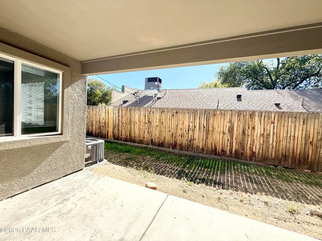 a view of a backyard with a garden