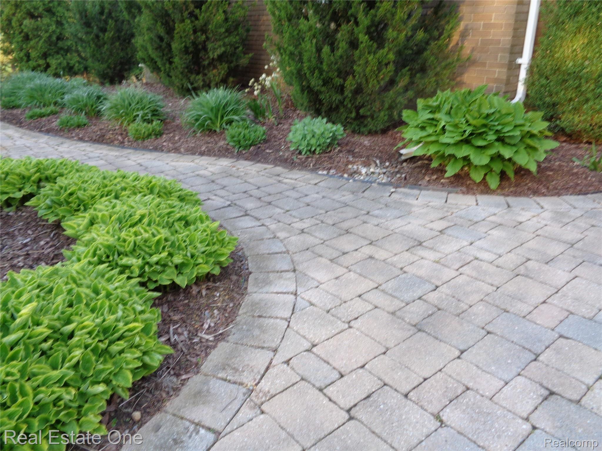 2572 Lake George Road Oakland, MI 48363 - Photo 62 of 83 Brick paver walkways to front entrance
