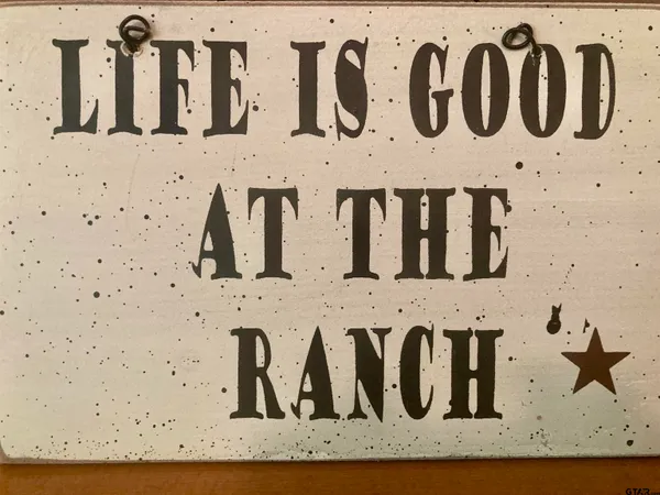 a bathroom with mirror and