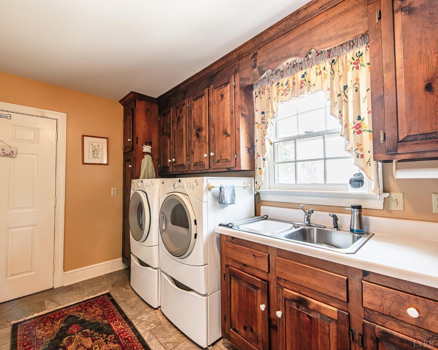 2667 Union Church Road Gladstone, VA 24553 - Photo 34 of 75 a utility room with sink dryer and washer