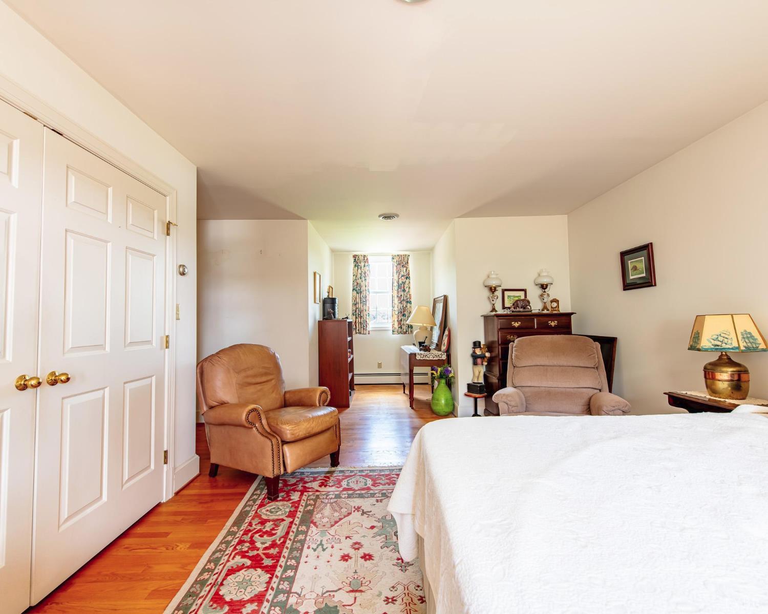2667 Union Church Road Gladstone, VA 24553 - Photo 39 of 75 a living room with furniture and a wooden floor