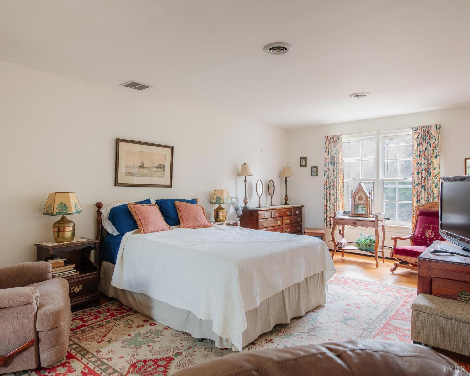 2667 Union Church Road Gladstone, VA 24553 - Photo 40 of 75 a bedroom with a bed couch and a window