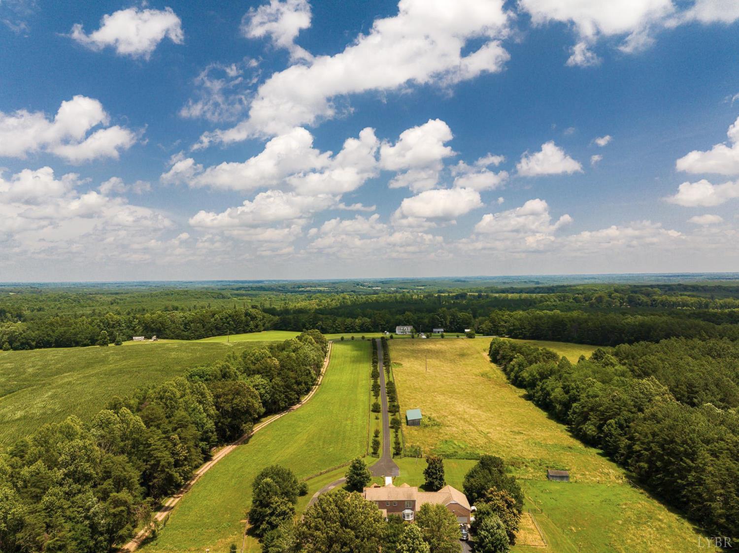 2667 Union Church Road Gladstone, VA 24553 - Photo 70 of 75 a view of a lake with a yard