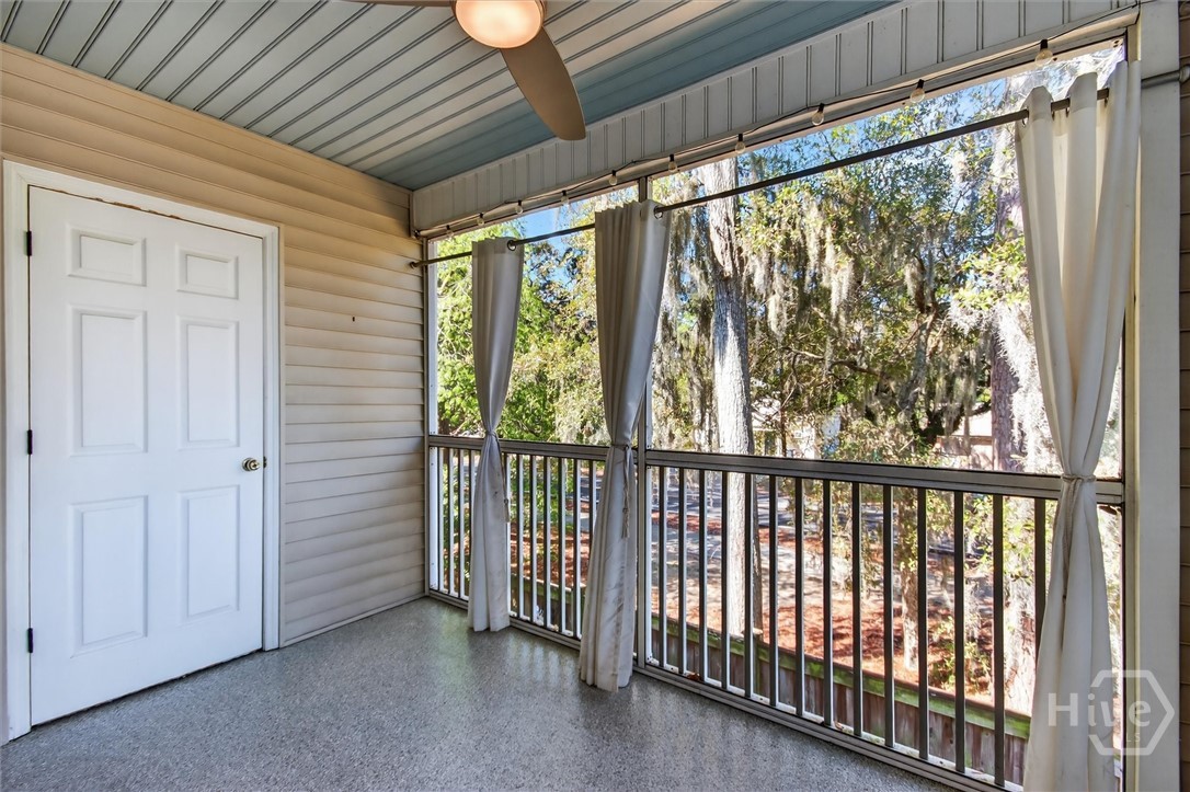 16 River Walk, Unit 16 Savannah, GA 31410 - Photo 12 of 37 Private, treehouse-like screened porch surrounded by greenery