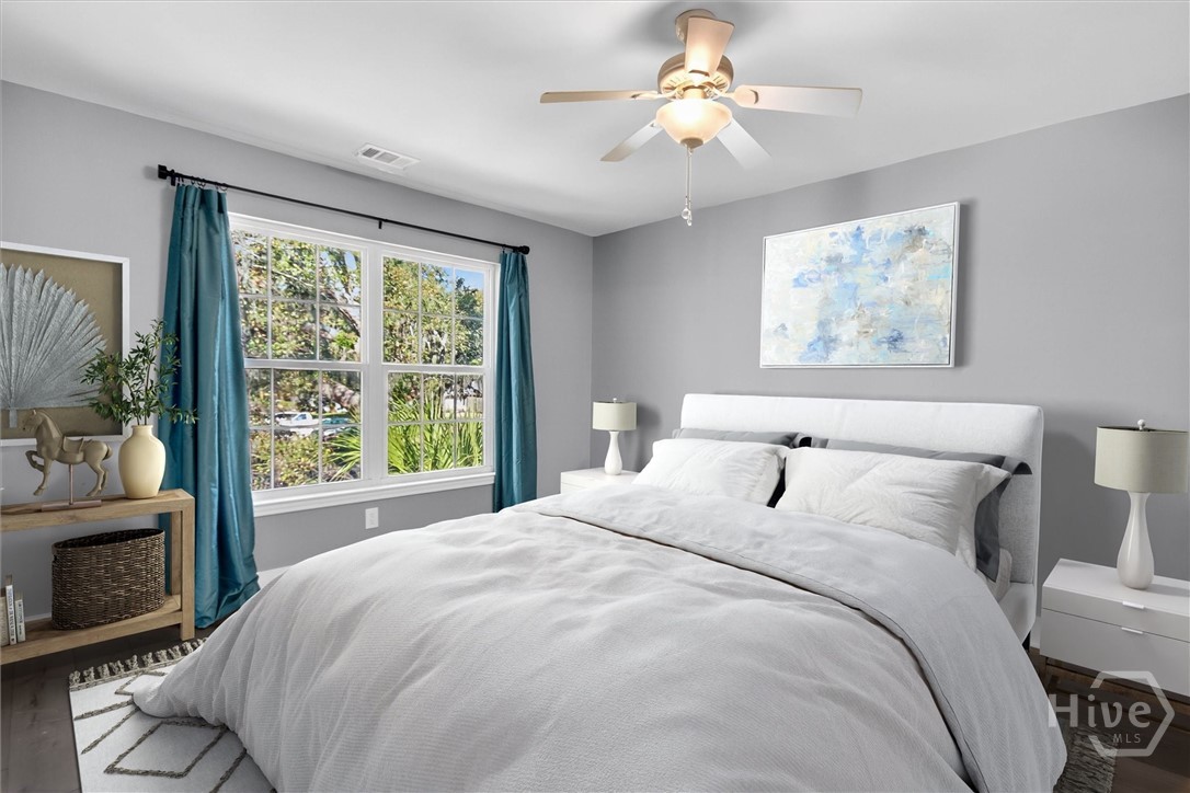 16 River Walk, Unit 16 Savannah, GA 31410 - Photo 9 of 37 Spacious primary suite with peaceful natural light