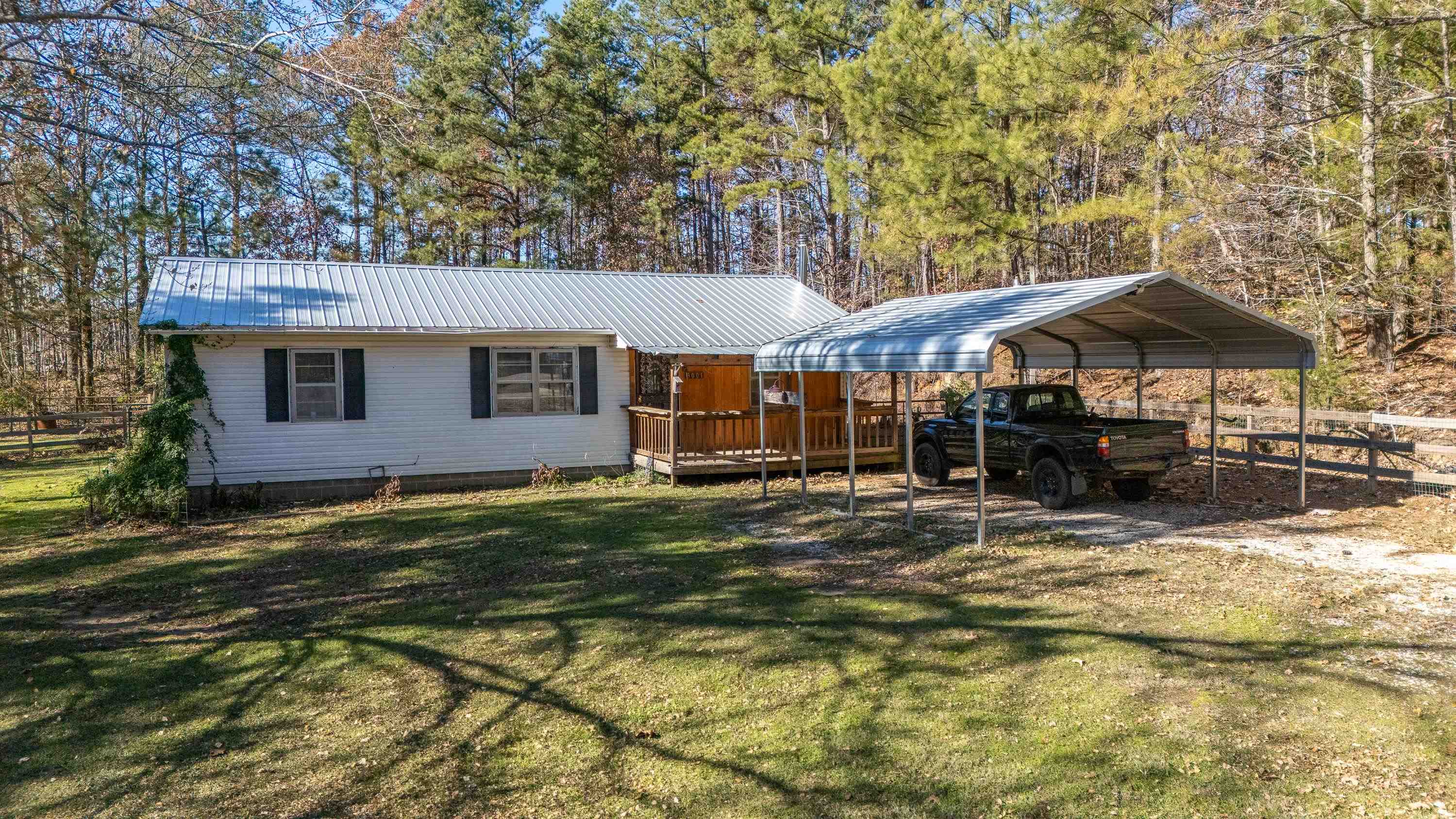 3001 Hamilton Road Ashland, MS 38603 - Photo 33 of 39 Exterior space with a carport and a lawn